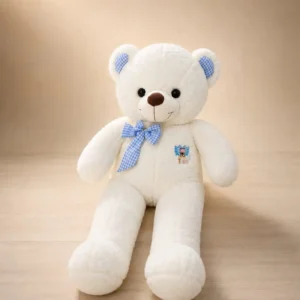 White teddy bear with blue gingham bow and matching ears